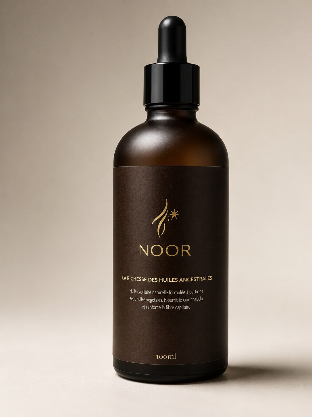 Flacon d'huile capillaire NOOR 100 ml, verre ambré et détails dorés